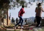 Kekerasan di Tepi Barat: Pemukim Israel Bongkar Makam dan Bakar Rumah Warga Palestina