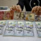 Kurs Dolar AS di BCA, BRI, Bank Mandiri, dan BNI Hari Ini: Apa yang Terjadi di Pasar Saham Asia?