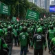 Pemerintah Siapkan Strategi Mitigasi PHK Massal dan Aturan Baru Komisi Ojol 8 Persen